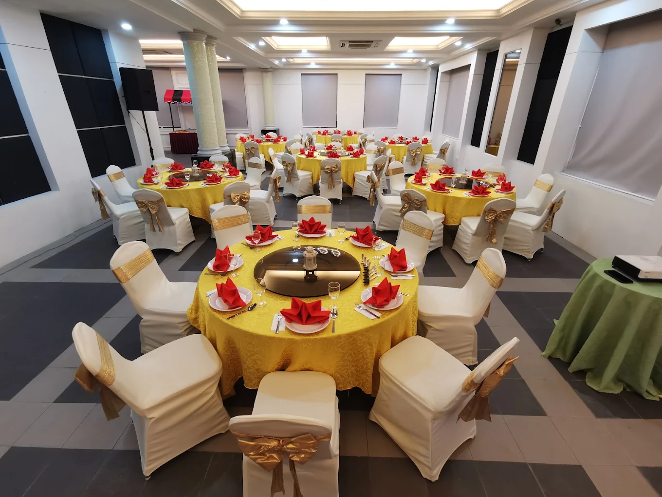 Banquet dining hall set with round tables at Restoran Pen Mutiara, Batu Maung, Penang